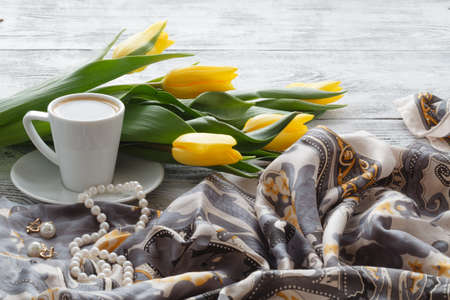 Table woman after receiving a bouquet of flowersの写真素材