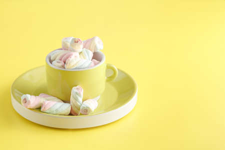 Twisted marshmallow on vibrant background, top viewの写真素材