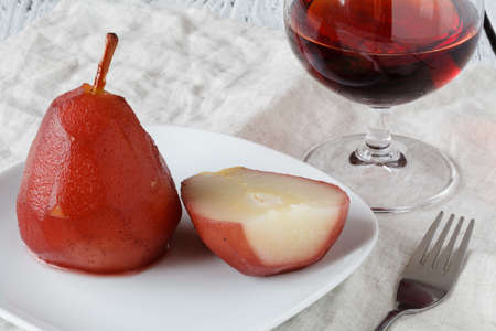 Pears poached in red wine sauceの写真素材