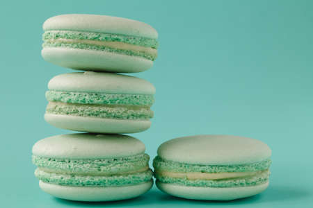 turquoise macaroons on aquamarine backgroundの写真素材