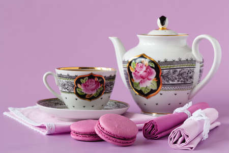 Antique porcelain coffee cups with hot espresso and tableware