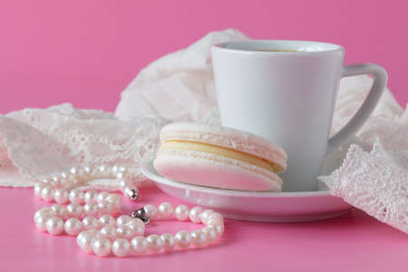 bathroom counter with coffee, vintage pearls jewelryの写真素材
