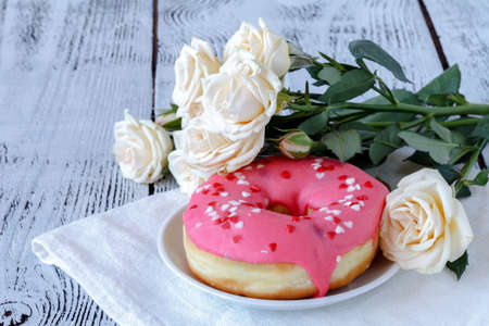 Lovely morning surprise donut and coffee and roseの写真素材