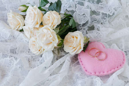 Wedding rings with roseの写真素材