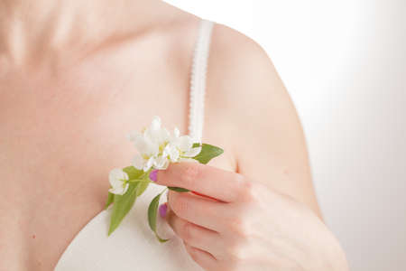 Apple blooms, Blossoming apple branch in hands