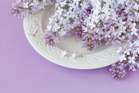 Flowers and morning coffee. Tasty breakfast. Light backgroundの写真素材