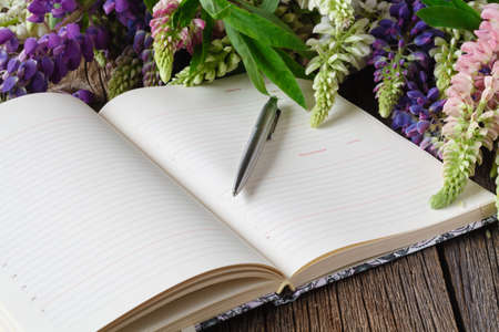 Cup of black coffee, Bouquet of flowers and Empty paper sheet