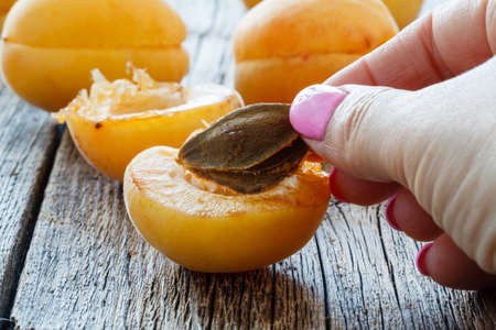 Fresh apricots on a wooden table