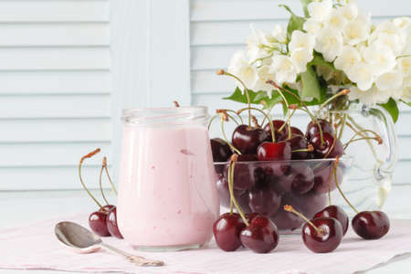 Healthy breakfast with yogurt and cherry berryの写真素材