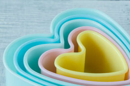 Heart shaped cookie cutter on white backgroundの写真素材