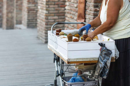 woman sells spices in a street marketの写真素材