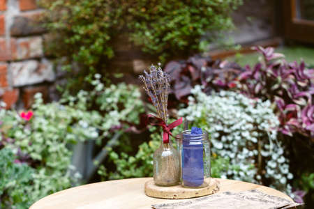 Street view of a empty coffee terrace with tables and chairs in old townの写真素材
