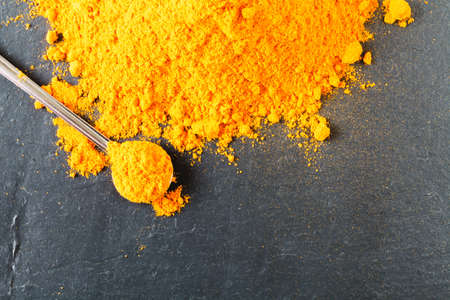 Turmeric Powder on slate, Herbal