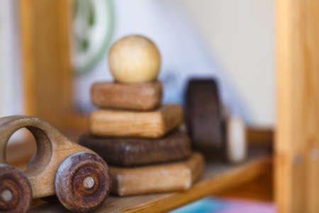 wooden toys on wooden table. Colorful toys made from wood