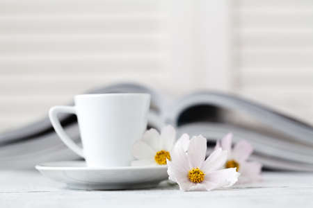 cup of tea on book with flower.の写真素材