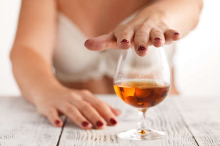 beautiful woman gesturing don't drinkの写真素材