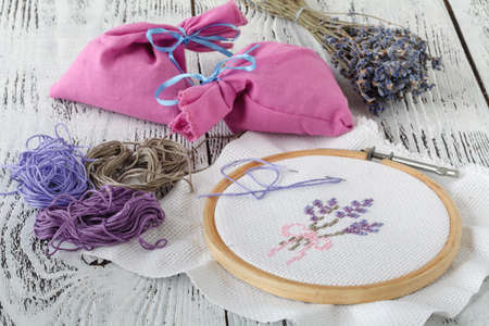 Embroidery Flowers. Sewing accessories. Canvas, hoop, thread mouline. Needlework. Hand embroideryの写真素材