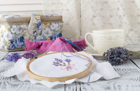 Embroidery Flowers. Sewing accessories. Canvas, hoop, thread mouline. Needlework. Hand embroideryの写真素材