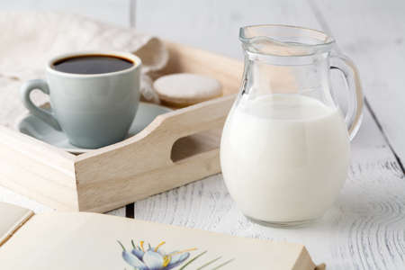 breakfast, tray with cup of coffee and sweetsの写真素材