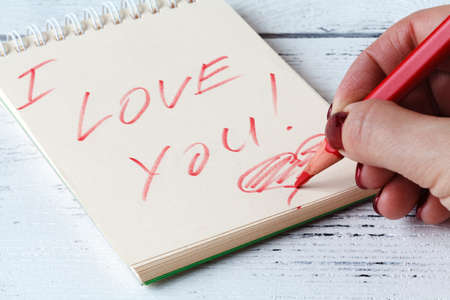 I Love You word on notebook pageの写真素材
