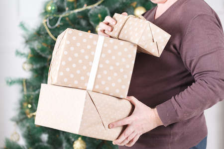 Man giving a christmas giftの写真素材