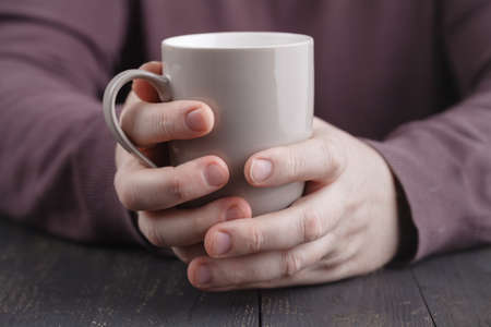 Man having a morning cup of coffeeの写真素材