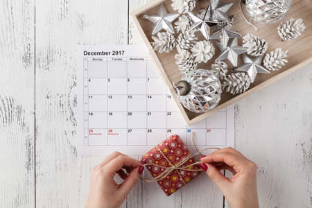 Decorations and calendar with Christmas Day marked outの写真素材