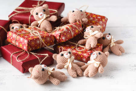 Cute teddy bear toys on a decorated gift boxesの写真素材