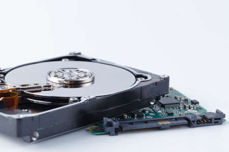Disassembled hard drive from the computer, hdd with mirror effect