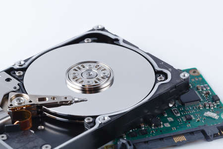 repair hard drive concept on white background with toolsの写真素材