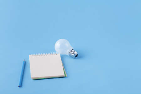 Colour pencils ready for drawing on blue background