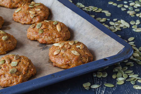 Fall snickerdoodle cookies with pumpkin and cinnamon overhead shotの写真素材