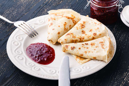 Russian traditional food. Appetizing fried pancakes during Pancake Weekの写真素材