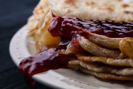 Pancakes with strawberry jamの写真素材