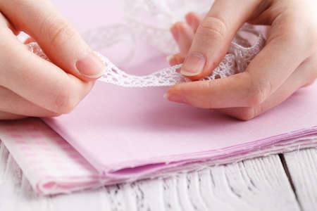 Young woman dressmaker or designer working as fashion designers, Choose yarns to the sewing fabric, profession and job occupationの写真素材