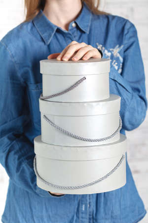 few gift box in female hands
