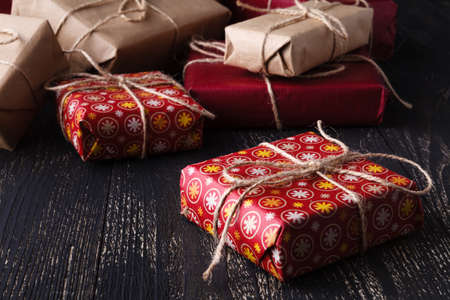 Few giftboxes on wooden tableの写真素材