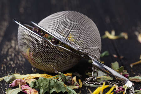 Dry herblal tea lay on wooden tableの写真素材