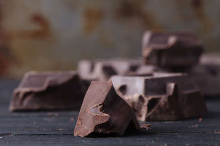 Close up dark chocolate on rustic table