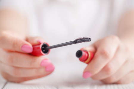 Closeup Mascara Bottle and Brush. Black Mascara wand and Tubeの写真素材