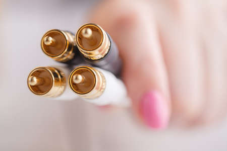 Hi-fi music cable in female handsの写真素材