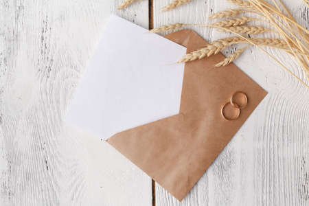 Craft envelope with two rings for wedding invitationの写真素材