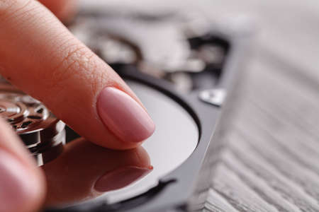 Repairing hard drive Hdd, touching by handの写真素材
