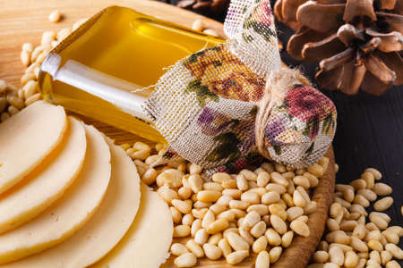 Cedar oil and cedar nuts, selective focusの写真素材