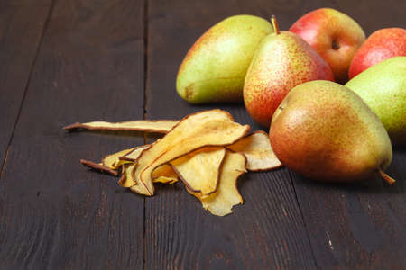 fresh pear with dried pear slices (chips)の写真素材