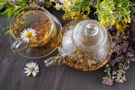 Cup of hot herbal tea. Home scene with hot drink. Detox or clean food conceptの写真素材