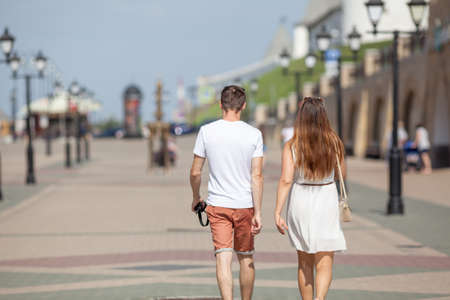 couple of female and male walk on streetの写真素材