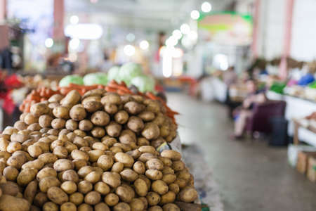 Fresh organic food at the local farmers market, potatoesの写真素材