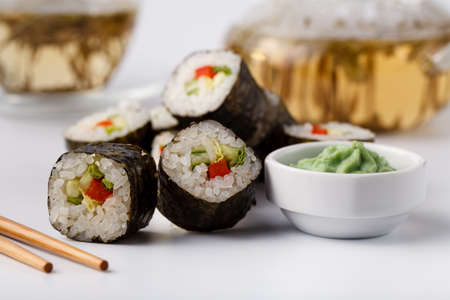 Japan rolls with fish and rice, pile asorted on tableの写真素材