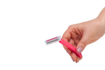 Hand with shaving razor isolated  on white background